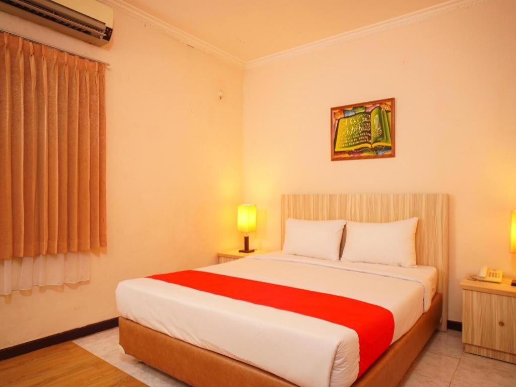 Capital O 142 Hotel Al Furqon Syariah Palembang Luaran gambar